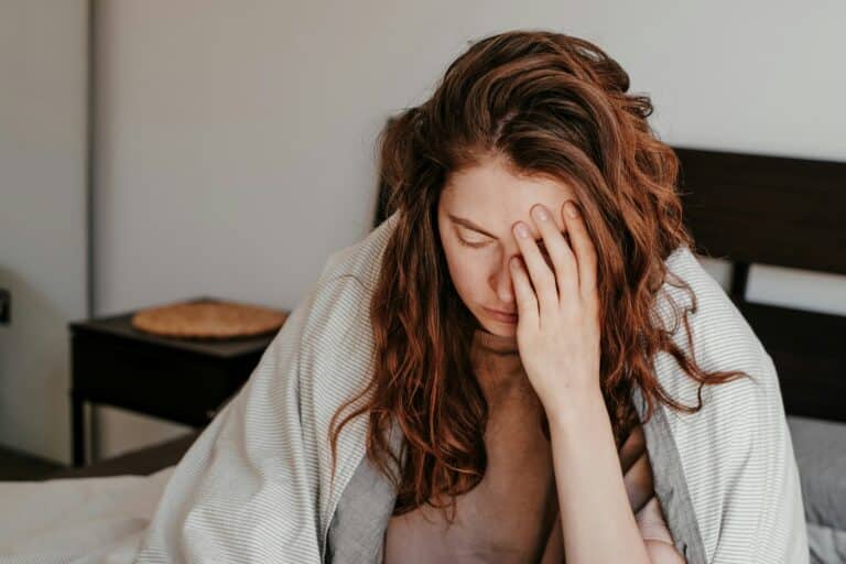 woman suffering from anxiety and depression may find some relief with cbd